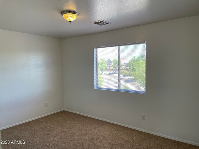 Building Photo - 23576 W Pecan Rd