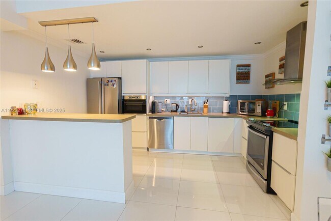 Building Photo - 19390 Collins Ave