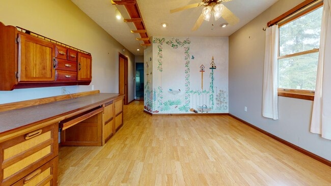 Building Photo - Country living! 1st floor laundry 3+ car garage with work shop