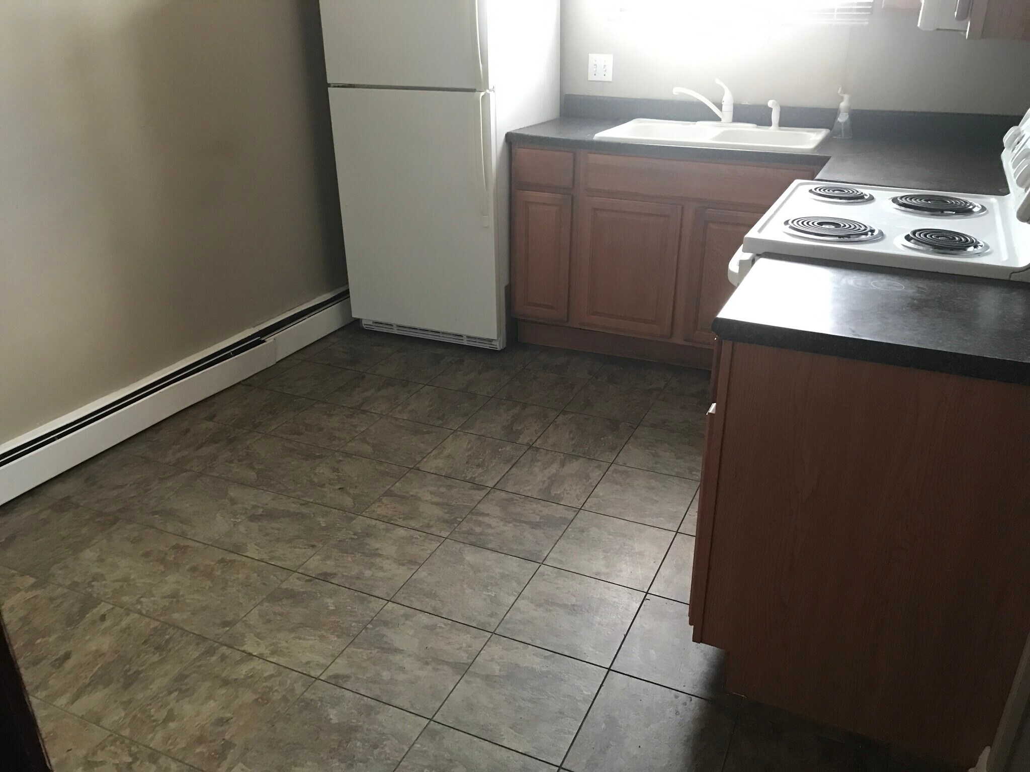 Kitchen with appliances - 1409 3rd Ave