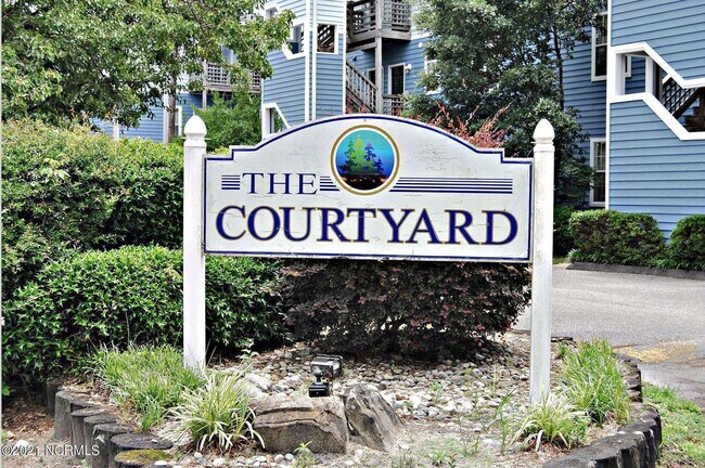 Building Photo - Renovated first floor condo with community...