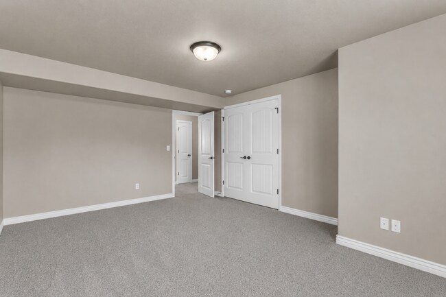 Building Photo - Spacious Syracuse Home with Covered Deck, Loft & Oversized 3-Car Garage