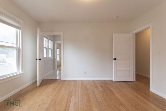 Building Photo - Lawn Care and Water Included! Remodeled 1930s Tulsa Home with 4 Beds, 3.5 Baths + Incredible Char...