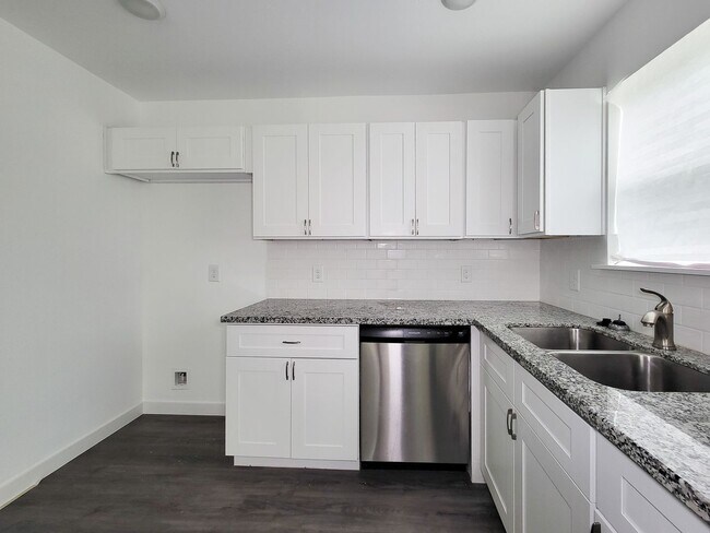 Building Photo - This newly constructed 3-bedroom, 2-bathroom unit offers modern living with 1,150 sq ft of space....