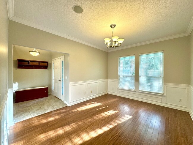 Building Photo - Coastal Charm: Luxurious 4-Bedroom Home in...