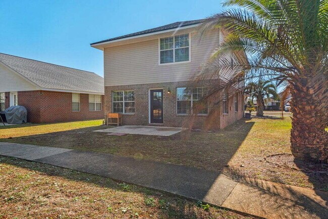 Building Photo - LAKE FRONT HOME & GATED COMMUNITY WITH COMMUNITY POOL IN NAVARRE!