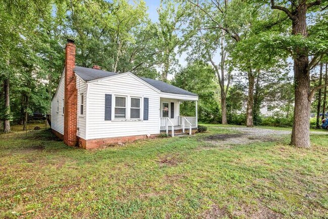 Building Photo - Adorable Home, Just Painted, Wood Flooring...