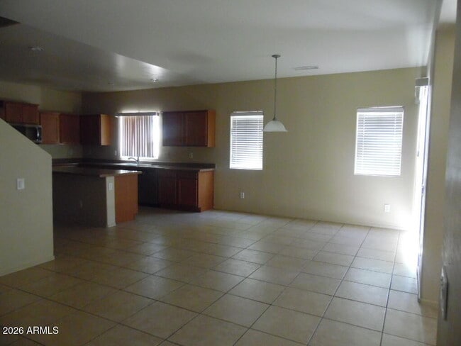 Building Photo - 8472 W Lewis Ave