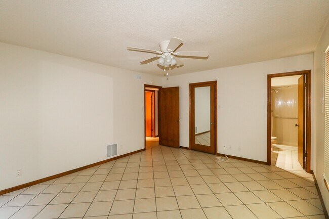 Building Photo - Two Bedroom, 2 Bath, 1-Car Garage, 1179 sq ft feet home with wood burning fireplace. and screened...