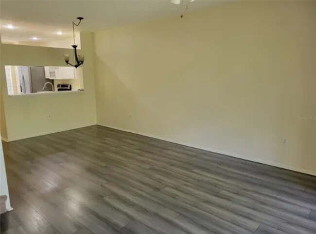 Living room and dining room - 8661 Hunters Key Cir