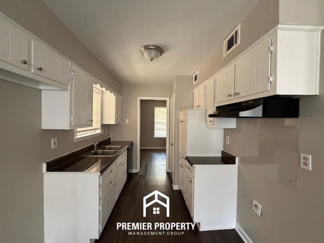 Building Photo - Spacious 4BR/2BA Home in Bartlett Cove | Brick Fireplace & Formal Dining