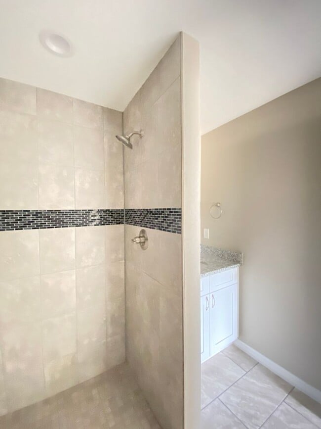 Building Photo - Limited Time Rent Reduction and NO applica...