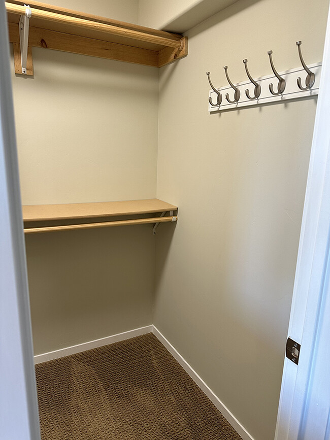 Large walk-in closet, right side. - 7079 Engineers Rd