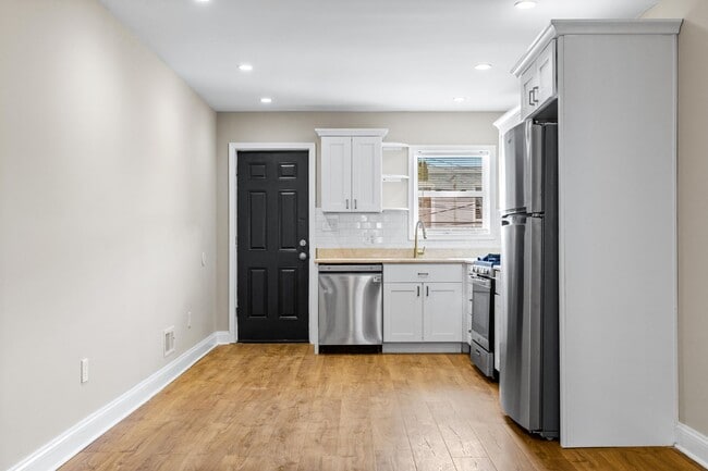 Building Photo - Parkside Haven: Contemporary 2-Bedroom Row Home Near Patterson Park