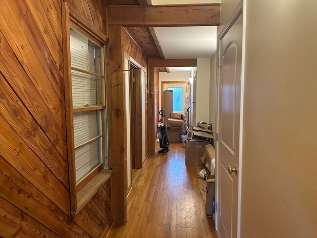 Building Photo - Unique 4 Bedroom with 2 Car Garage and out...