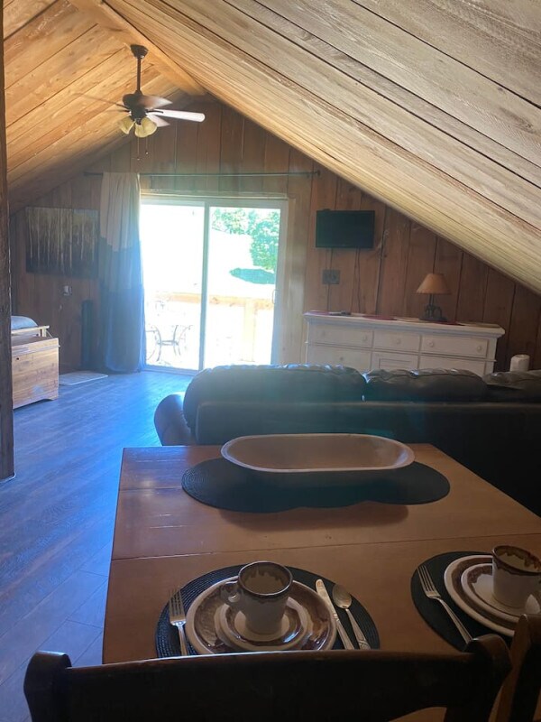 view from kitchen table across living room out entry door - 1314 Rugby Rd