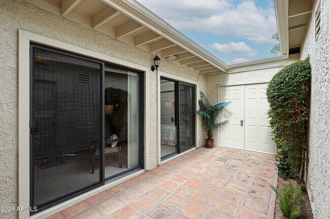 Building Photo - 7720 N Pinesview Dr