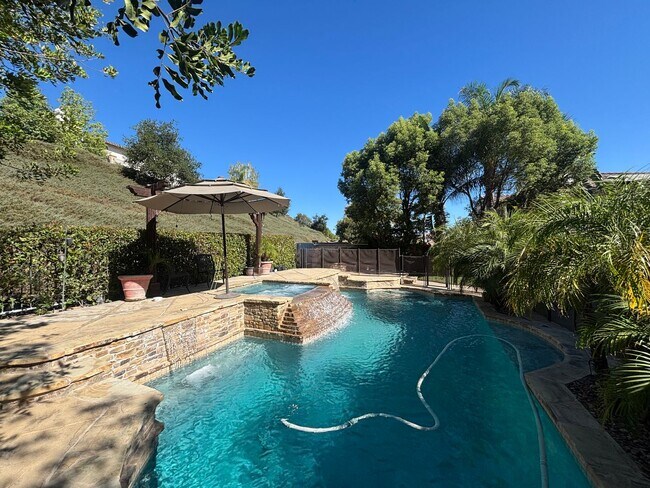 Building Photo - Spectacular 5-Bedroom Home with Private Po...