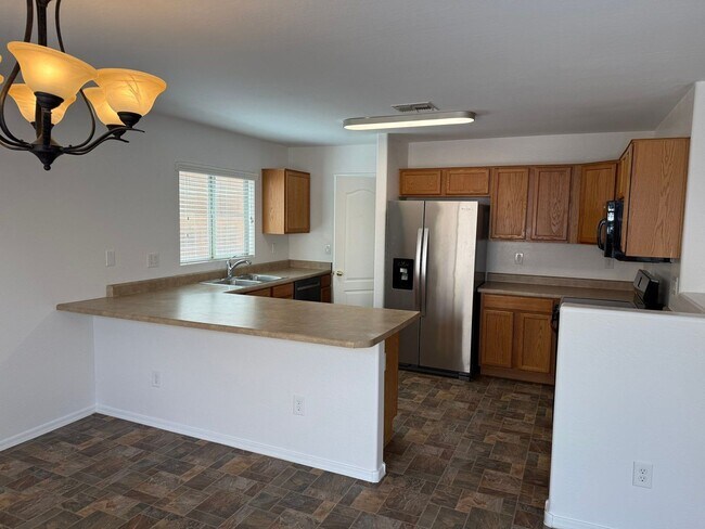 Building Photo - 5992 E Vega Ct