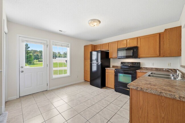 Building Photo - Welcome to Cornerstone Village!