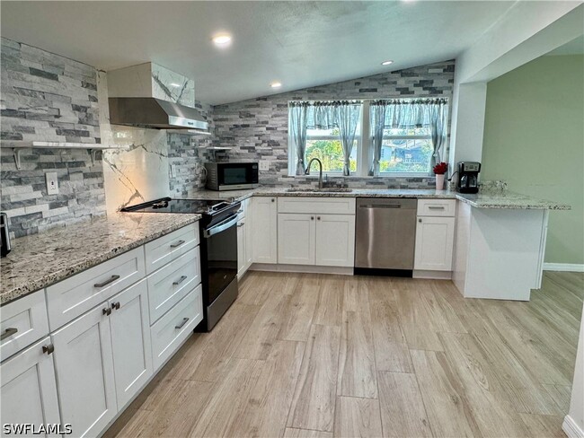 Building Photo - 829 107th Ave N