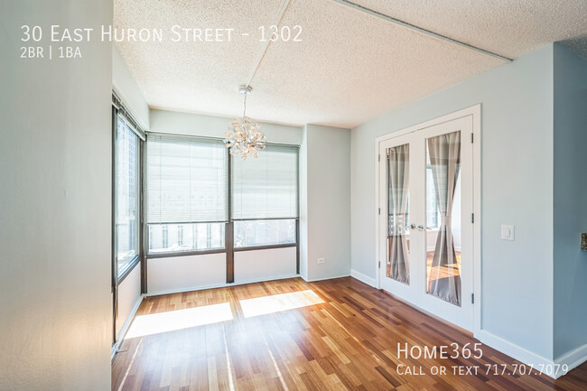 Building Photo - Modern 2-Bed, 1-Bath Condo in the Heart of...