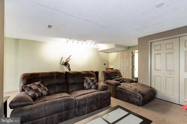 Building Photo - Spacious Townhome with Modern Amenities and Relaxing Outdoor Space near Fort Meade
