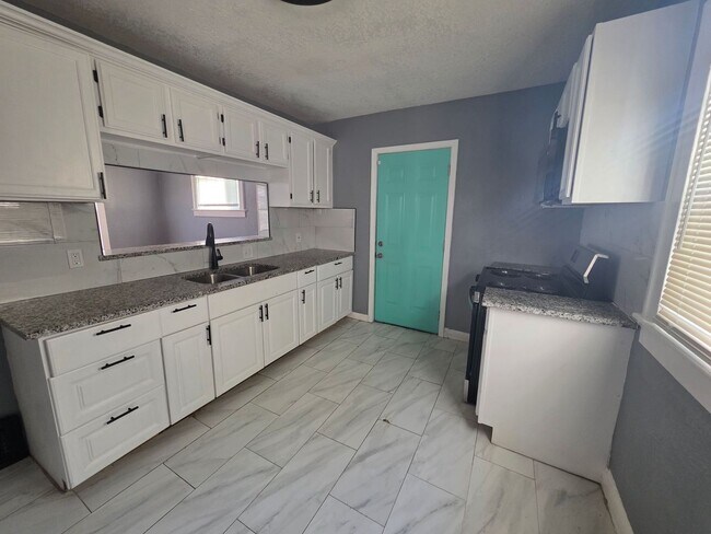 Building Photo - Charming 4 Bedroom, 2 Bath Home with Character & Space