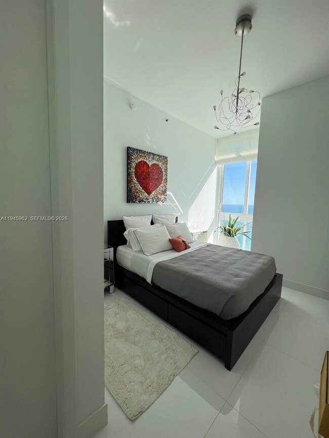 Building Photo - 15811 Collins Ave