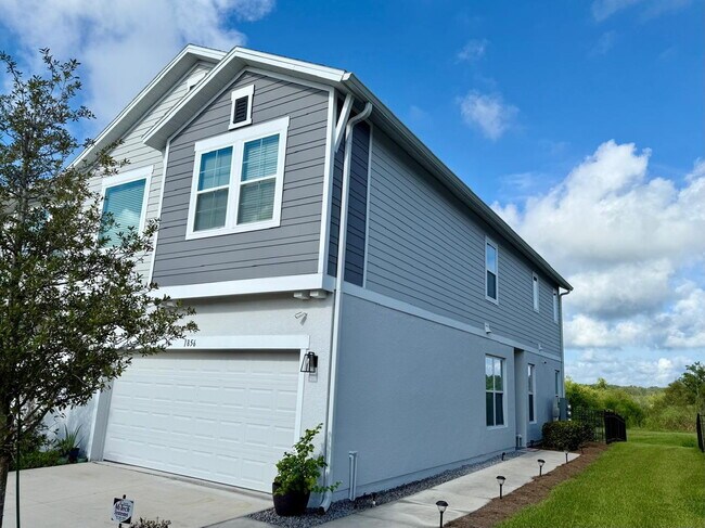 Building Photo - Spacious 4-Bedroom Corner Townhome with Loft & Lake Views in Ocoee