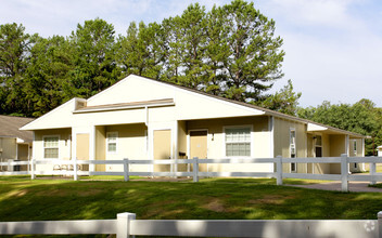 Building Photo - The Cottages Apartments