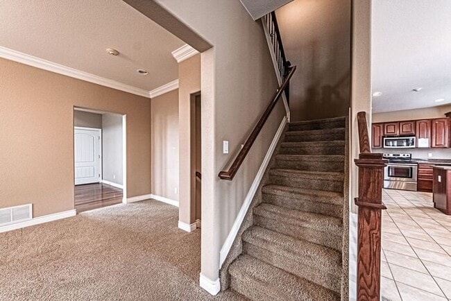 Building Photo - Stunning 5BR Home with Luxury Master Suite & Low-Maintenance Yard!