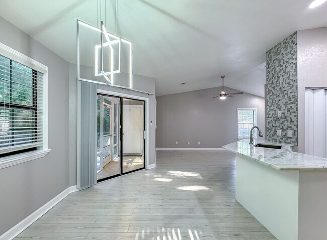 Building Photo - MODERN & Redone 1/1 w/ Tile Floors Throughout, Stainless Appliances, Granite Counters, Washer/Dry...
