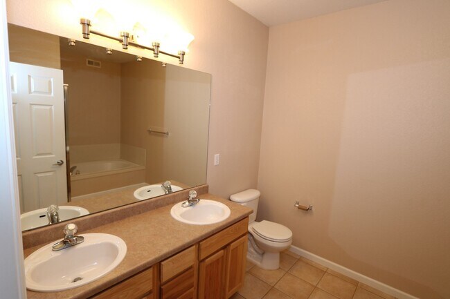 Building Photo - Spacious Top-Floor Condo in Las Casas at Broadmoor Bluffs | 2 Bed / 2 Bath + Garage, Very close t...