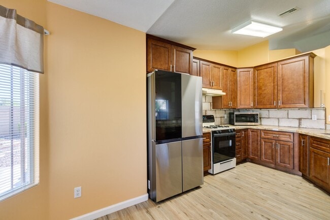 Building Photo - Updated Mediterranean-Style Home with Priv...