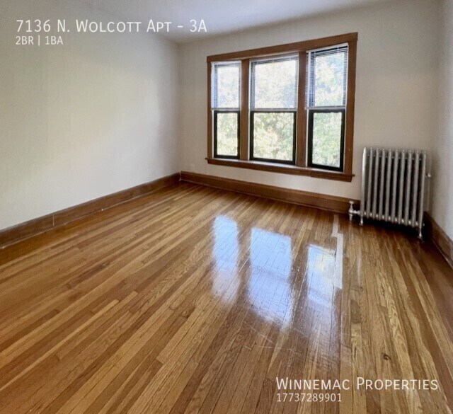 Building Photo - 7136 N Wolcott Ave