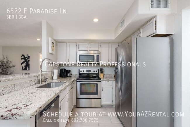 Building Photo - 6522 E Paradise Ln