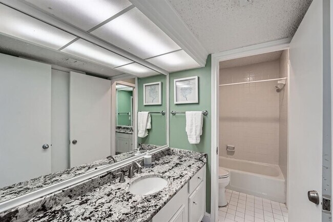 Building Photo - 204 World of Tennis Sq