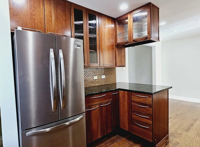 Building Photo - Upscale Living at Its Finest