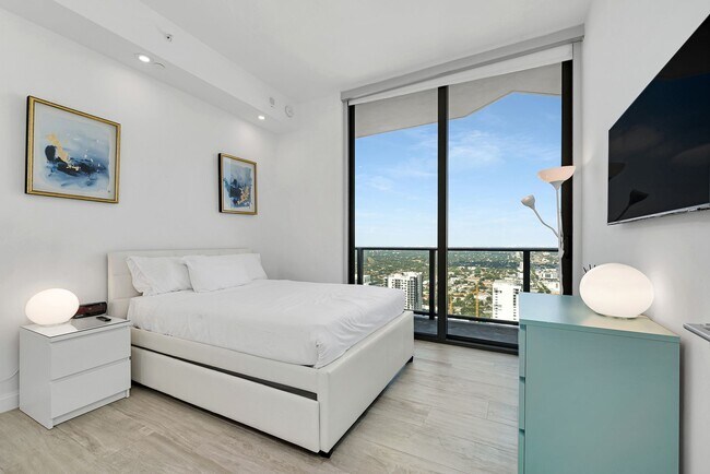Building Photo - Remarks:	Enjoy stunning Skyline and Bay views from the wraparound balcony of this furnished 2-bed...