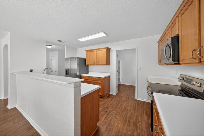 Building Photo - 4935 Dahlia Terrace