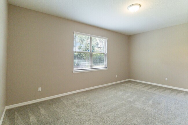 Building Photo - Gorgeous Energy Efficient 4/2 Home in Gated Community Close to Lake Nona