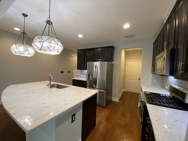 Building Photo - Immaculate Hillsborough Townhome