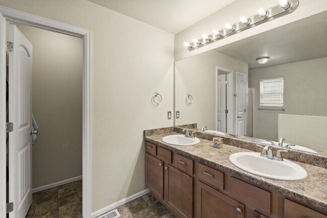 Building Photo - Spacious 4-Bedroom Home with Loft, Solar & Fenced Backyard