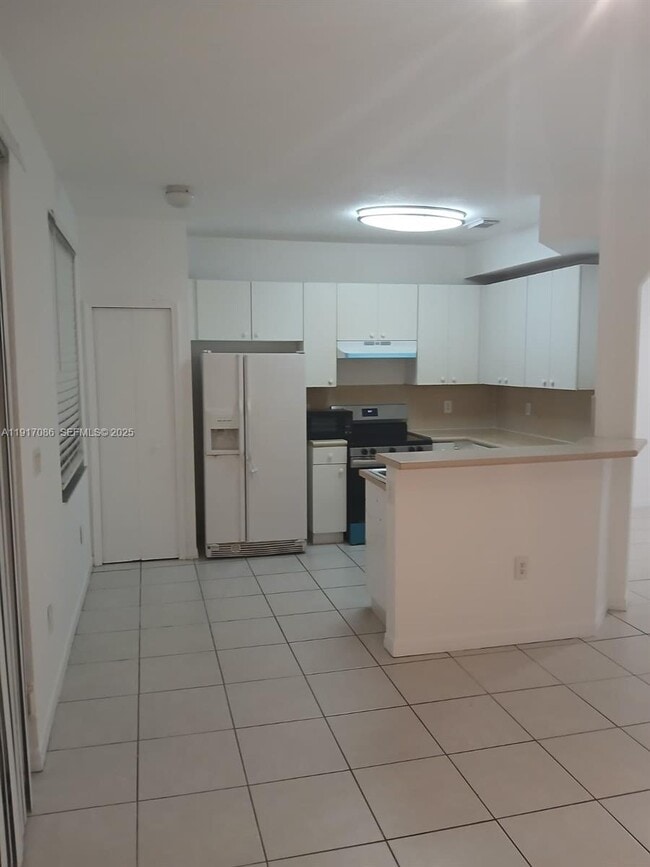 Building Photo - 24386 SW 109th Ct