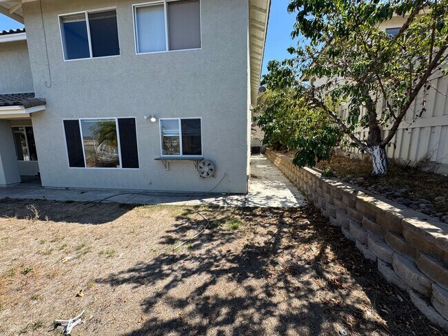 Building Photo - Gorgeous for 4 Bedroom and gated community