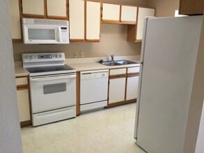 Building Photo - 2 BEDROOM 2 BATH CONDO ON 2ND FLOOR AT MYR...