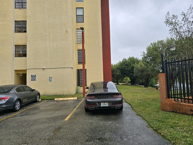 Parking spaces, where the Genesis is and the next one, on the side of apartment - 9686 Fontainebleau Blvd