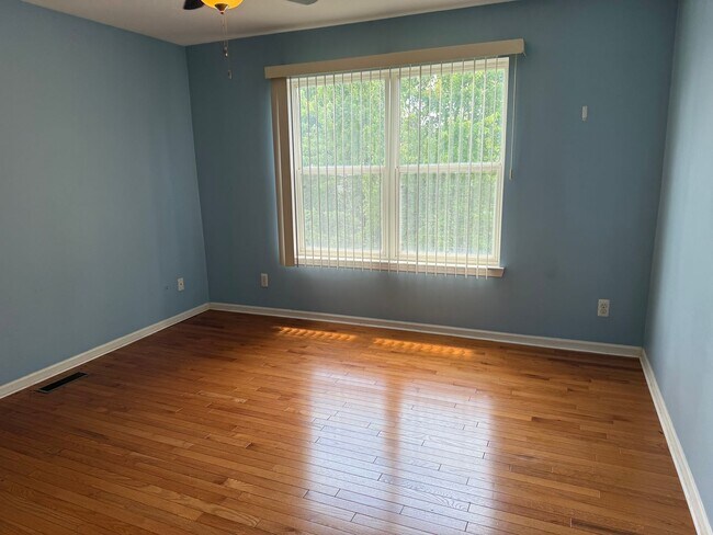 Building Photo - Large 2 Story home with 3 Bedrooms, 2.5 baths, hardwood floors, office and finished basement