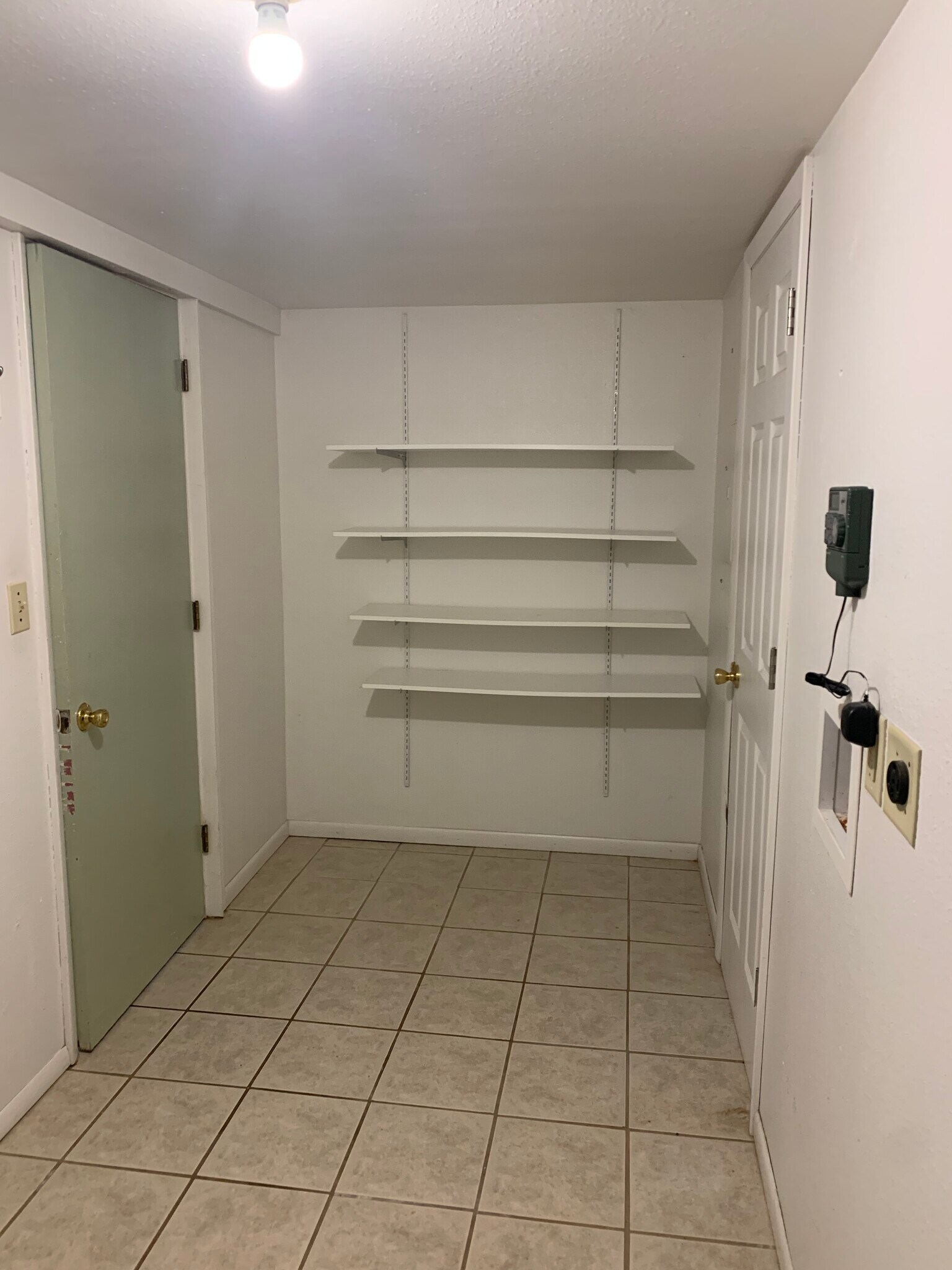 Storage room with laundry hookups - 705 Maple St